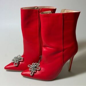 Chic Red Heeled Boots with Embellishments